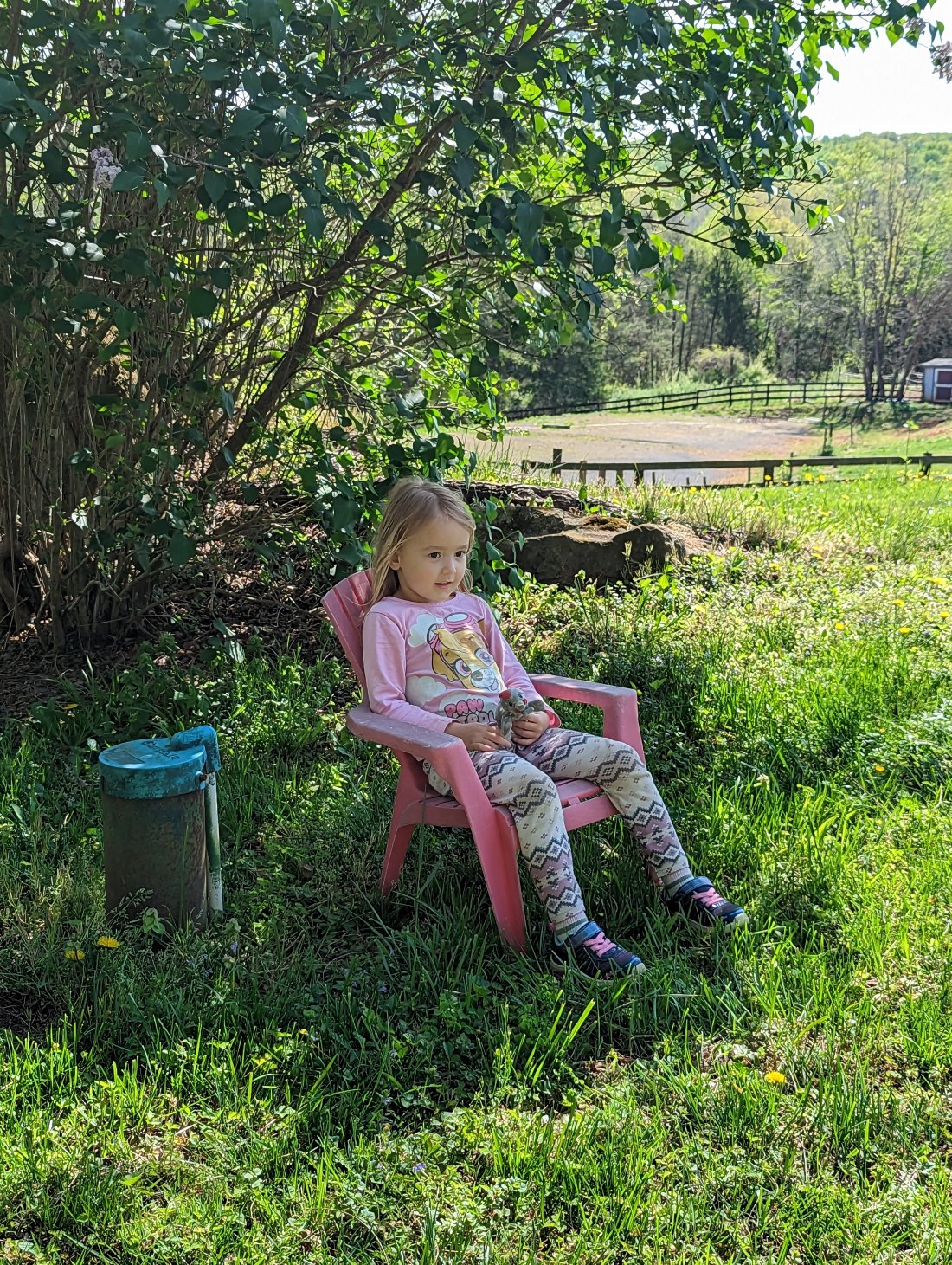 girl sitting in the shade