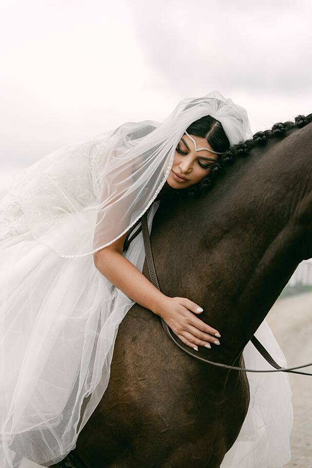 bride on her horse for her wedding