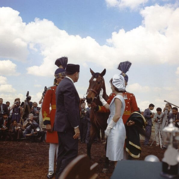 Jackie Kennedy being presented with a horse from the Pakistan Mohammed Ayub Khan