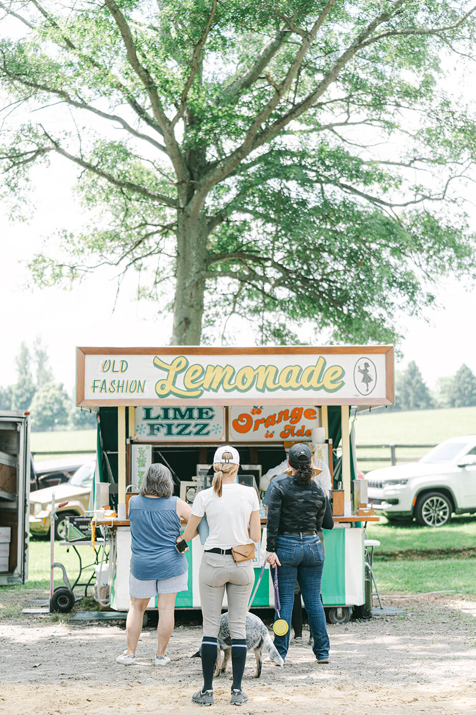 lemonade stand at Upperville horse show with people waiting in line